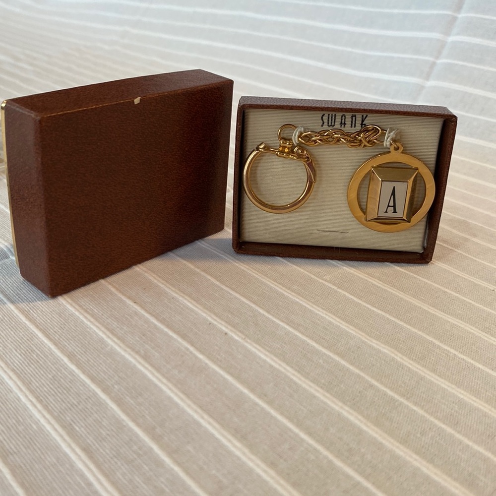 SWANK Gold Toned Key Chain with the initial A. double link chain. New in box.